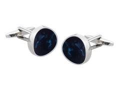 Kurvige blaue Manschettenknöpfe. Marmoroptik